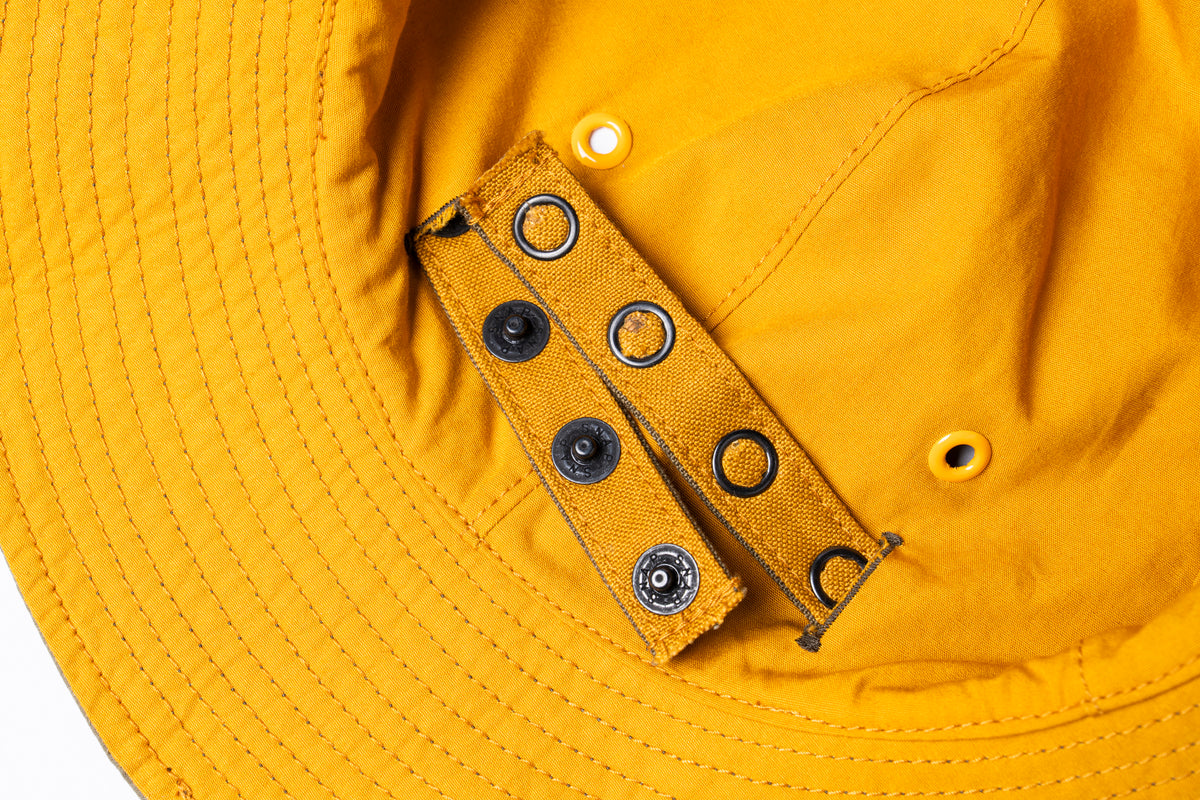 REVERSIBLE SUN HAT WITH ADJUSTABLE BAND